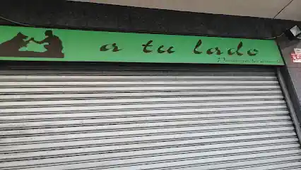 A TU LADO